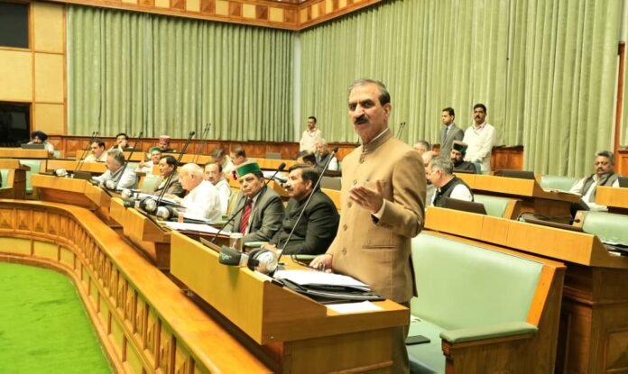 Chief Minister Thakur Sukhvinder Singh Sukhu being presented a cheque of Rupees Two crore by Chairman, Himachal Pradesh