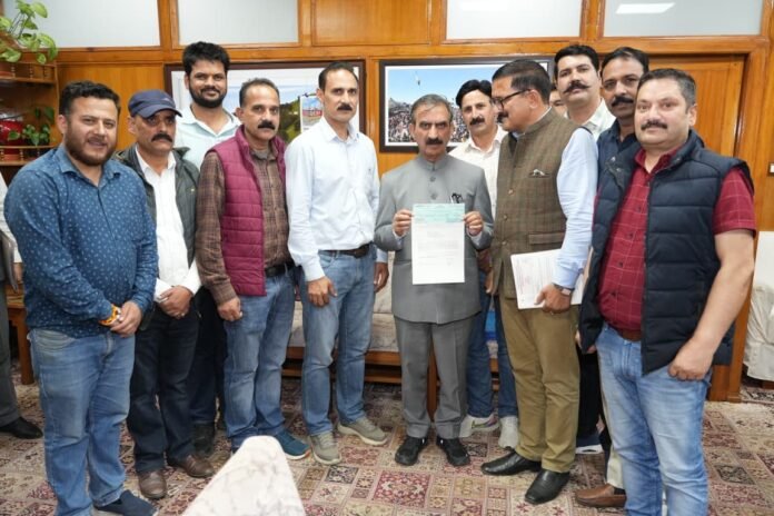 Chief Minister Thakur Sukhvinder Singh Sukhu being presented a cheque of Rupees One lakh one thousand by MLA