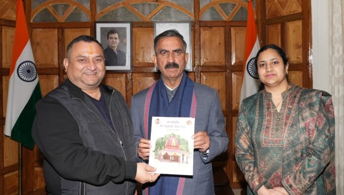 invitation of International Shri Renukaji Fair- 2025 to cm Chief Minister Thakur Sukhvinder Singh Sukhu being presented a cheque of Rupees one Crore by Vice Chairman